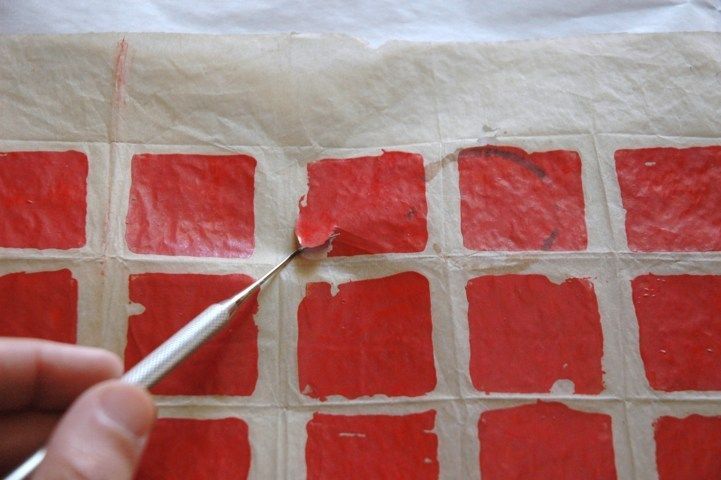 Collezione dell’artista Castagno L. Carta piegata Smalto su carta velina Prima del restauro Lacerazione del supporto