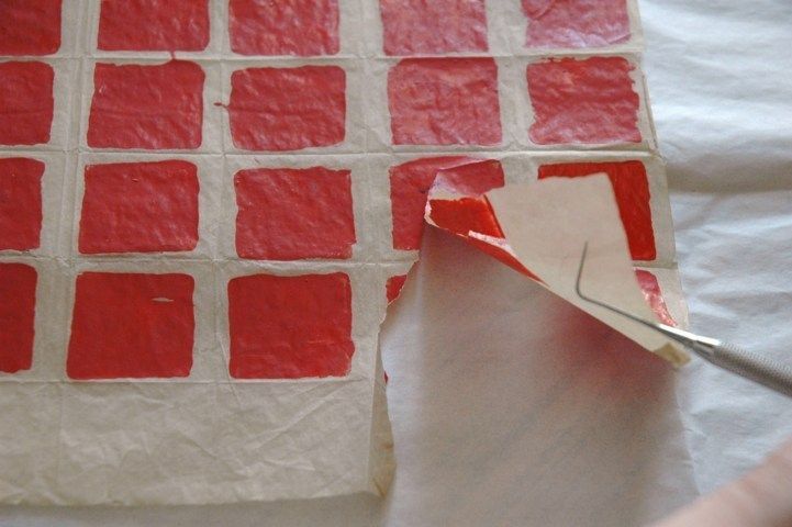 Collezione dell’artista Castagno L. Carta piegata Smalto su carta velina Prima del restauro Lacerazione del supporto