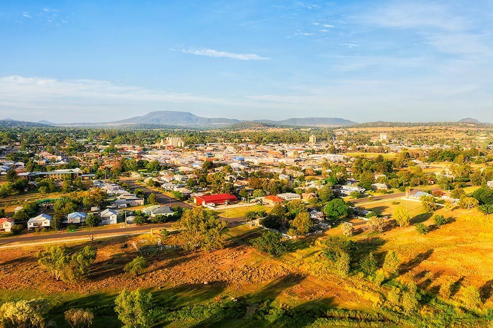 An Aerial View Of A Small Town Surrounded By Trees And Grass — North West Heating, Cooling and Refrigeration in Gunnedah, NSW