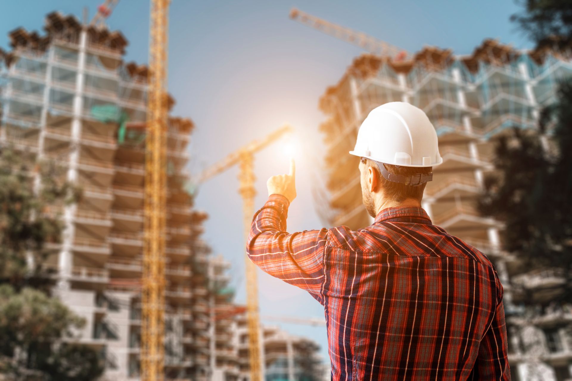 Engineer architect controlling construction process of modern building site. Engineer architect controlling construction process of modern building site.