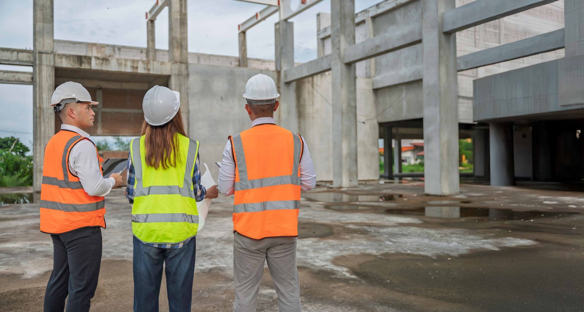 A team of structural engineers reviews construction safety and site progress. A team of structural engineers reviews construction safety and site progress.
