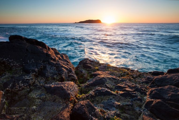 The Sun Is Setting Over The Ocean — Dazzling Blue Pool & Spa Centre Gold Coast in Tweed Heads, NSW