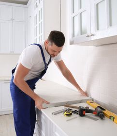 Worker Installing New Countertop
