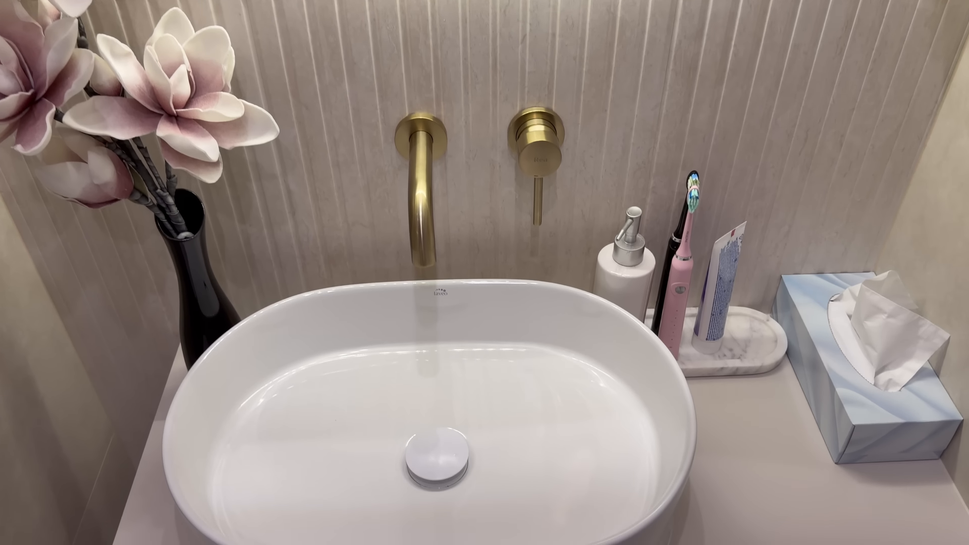 Professional cleaner finishing a kitchen during same-day cleaning in Woodside, Queens