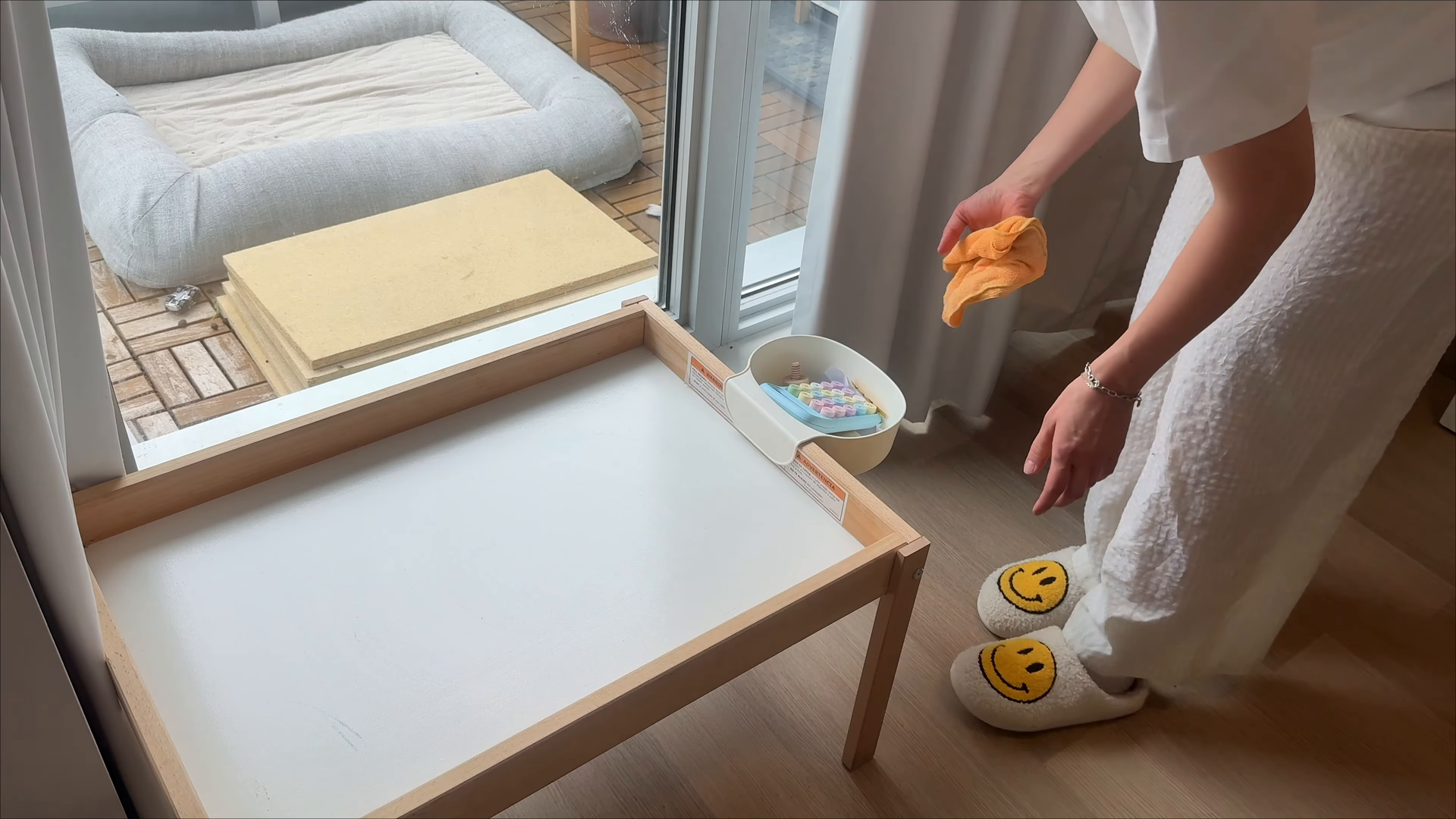 Cleaner returning for a free guaranteed re-clean visit in an NYC apartment