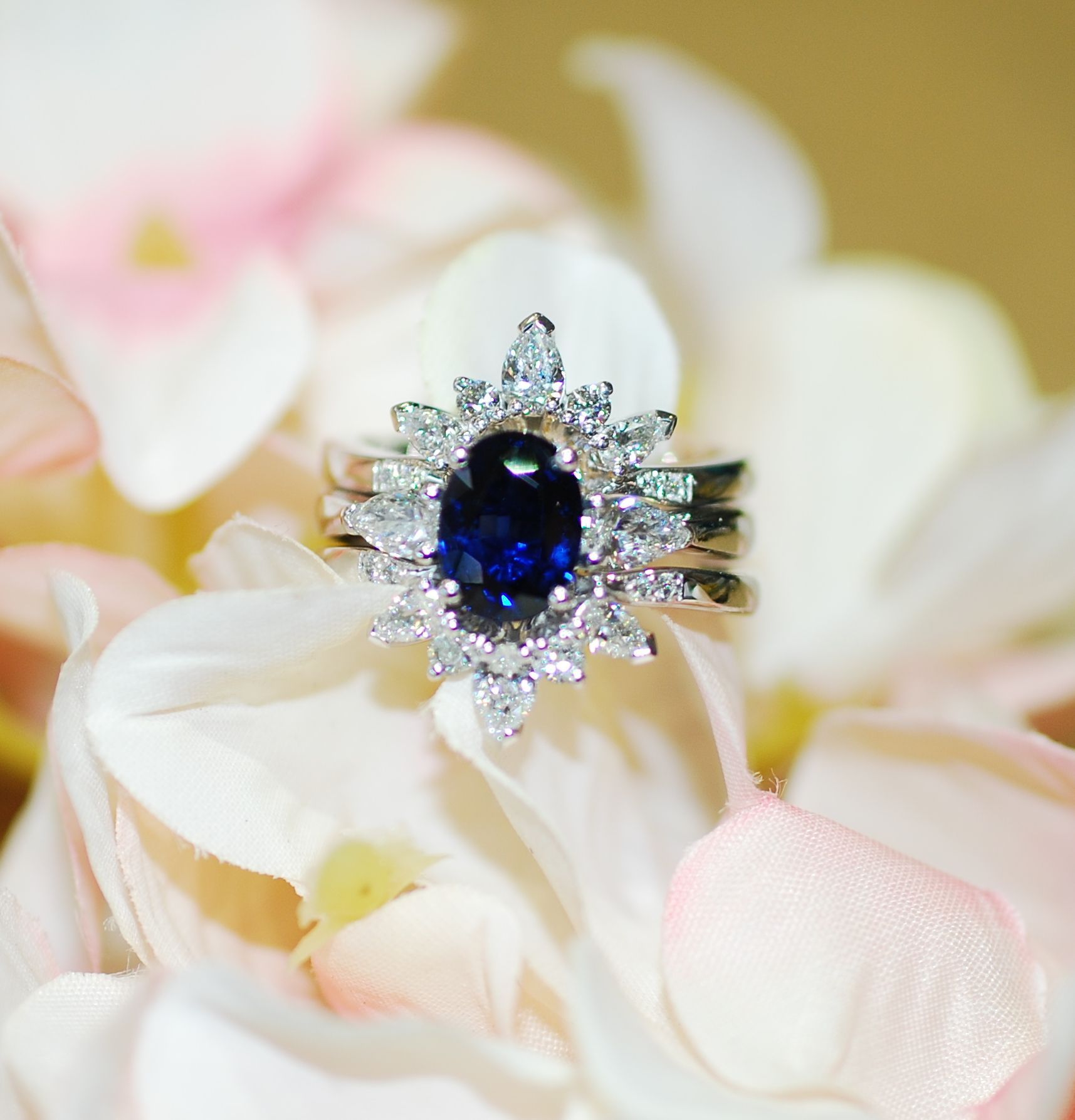 Sapphire and diamond ring on white flowers — K. Smith & Son Jewellers In Caloundra, QLD
