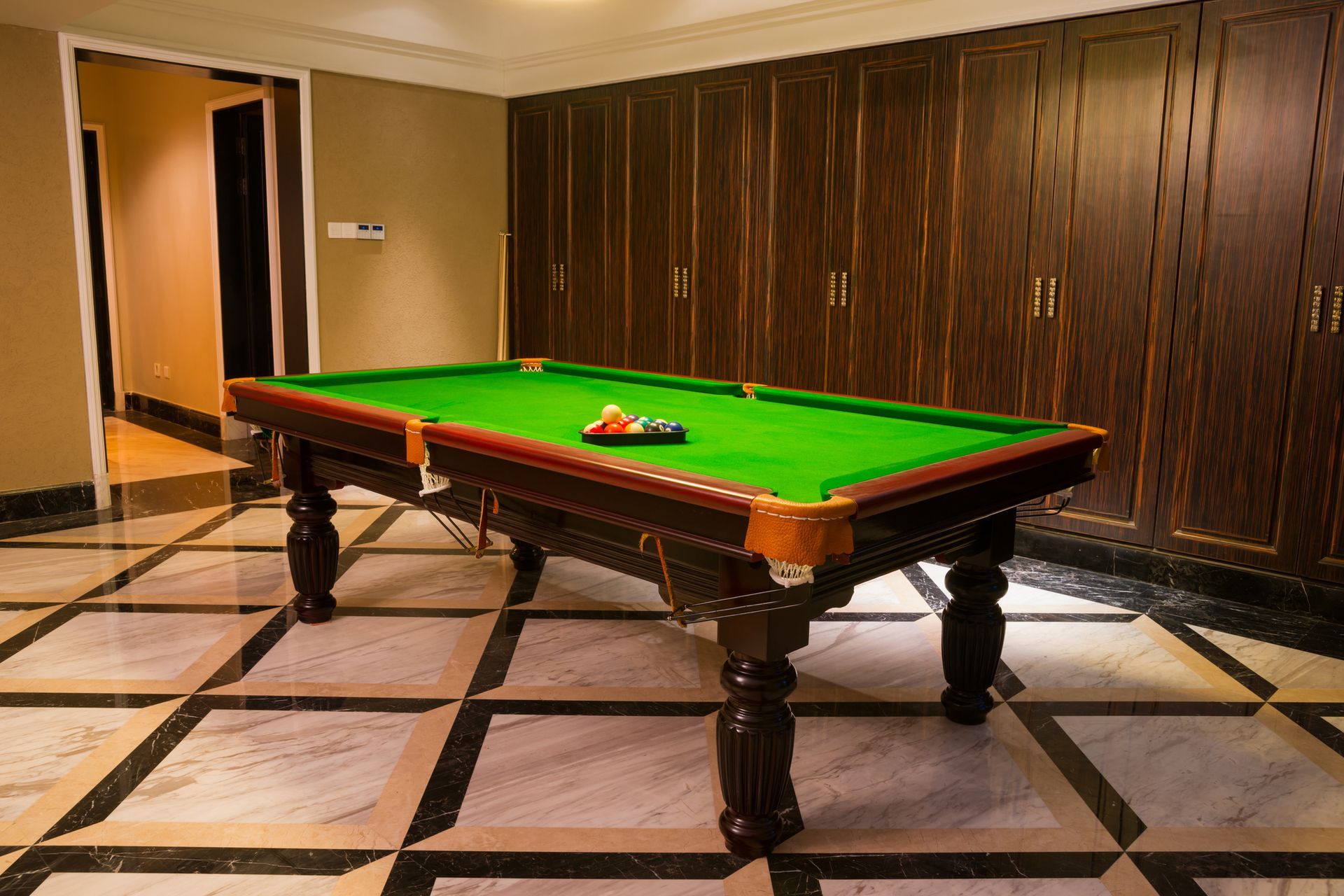 Side view of a pool table. Atlas Billiards offers Pool Table Refelt.
