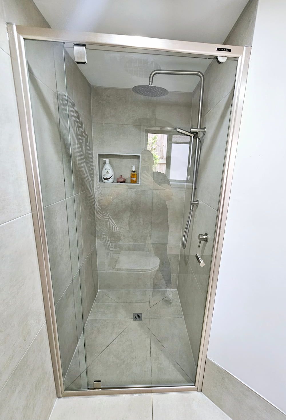 A Bathroom With A Walk In Shower And A Toilet — Mobile Shower Door Doctor In Mountain Creek, QLD