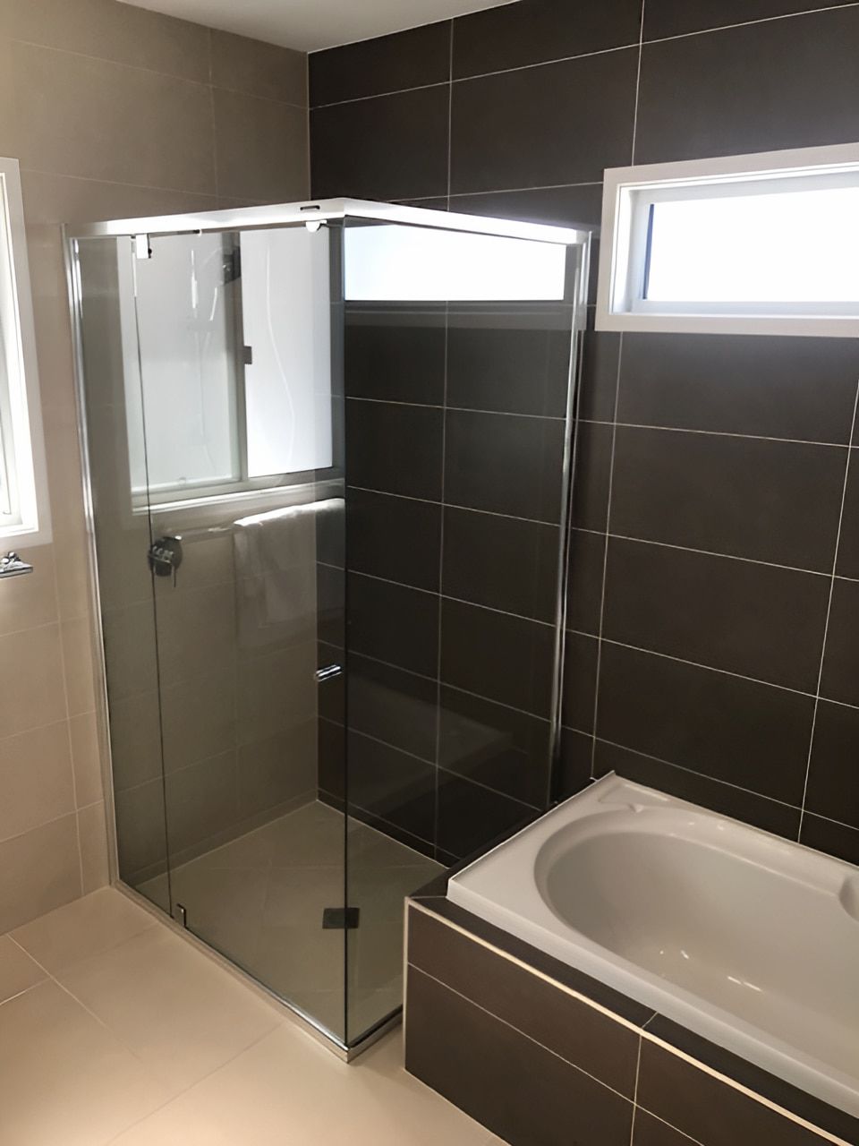 A Bathroom With A Tub , Shower , And Window — Mobile Shower Door Doctor In Noosa, QLD