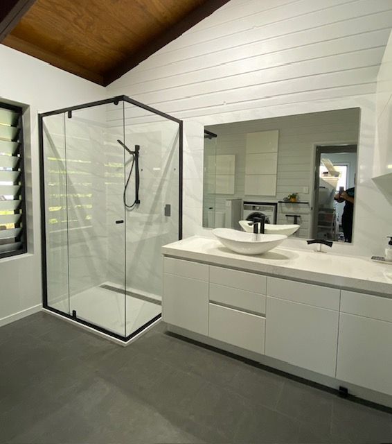 A Bathroom With A Sink And A Walk In Shower — Mobile Shower Door Doctor In Mountain Creek, QLD