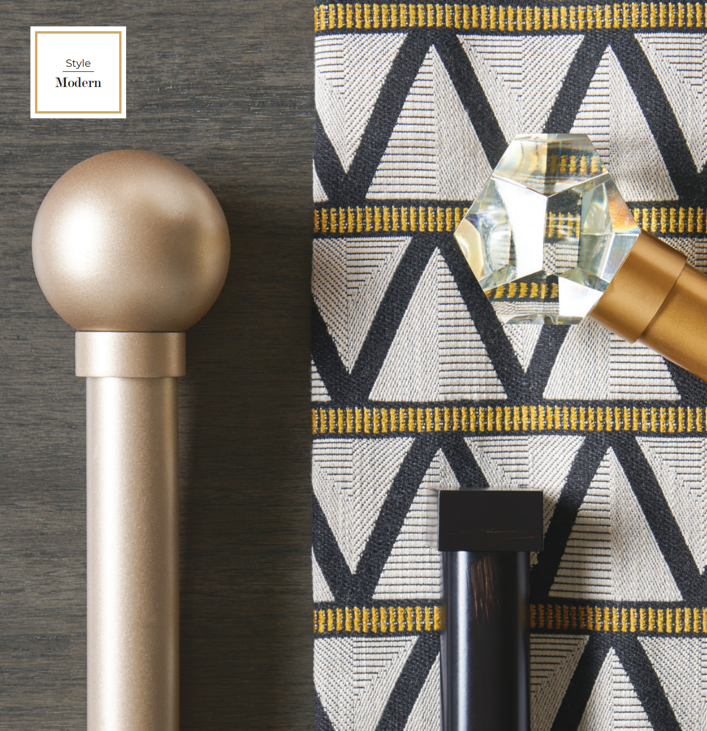 Gold and black curtain rods with geometric patterned fabric.