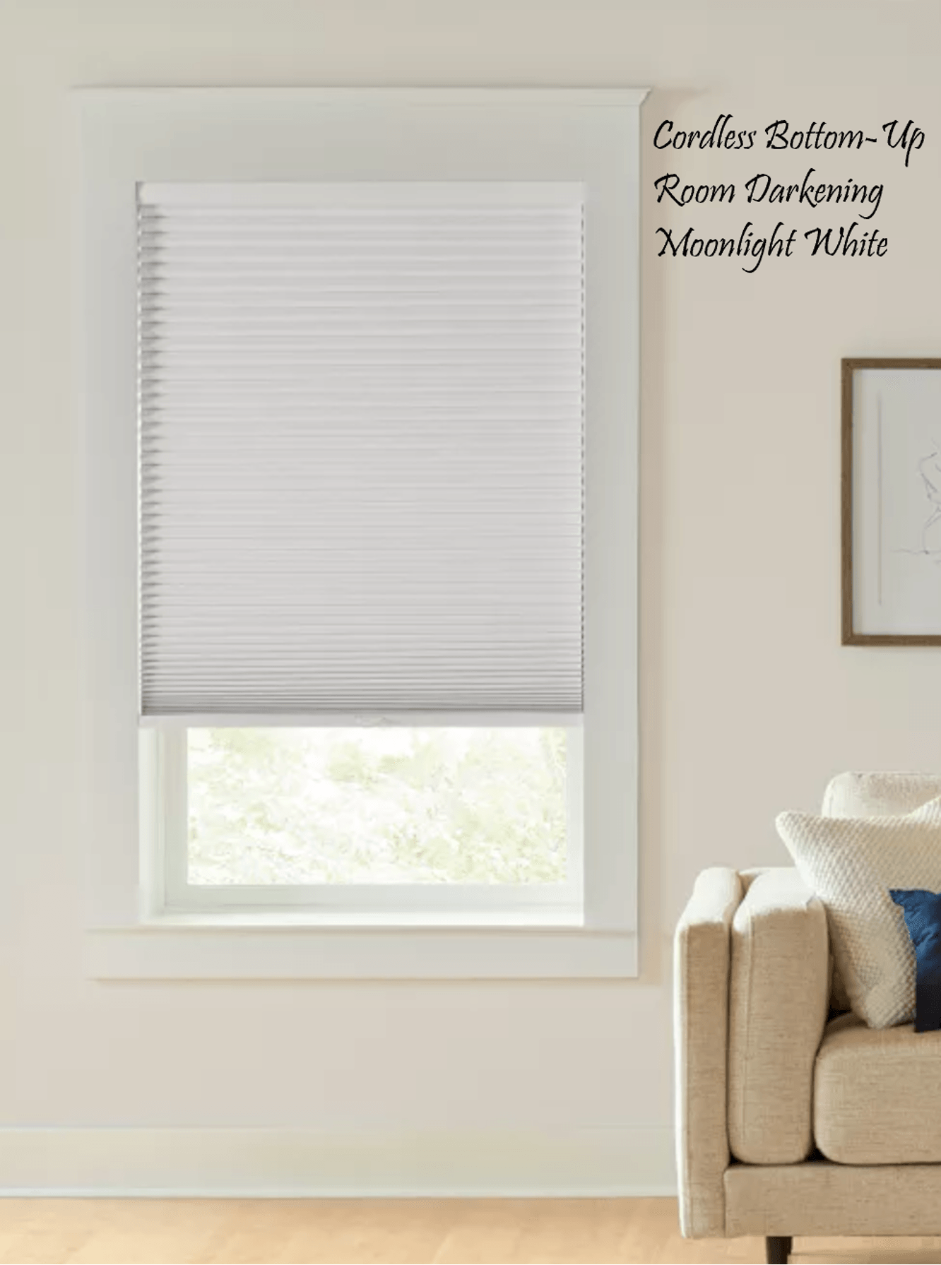 White cellular bottom-up room darkening shade in a window.