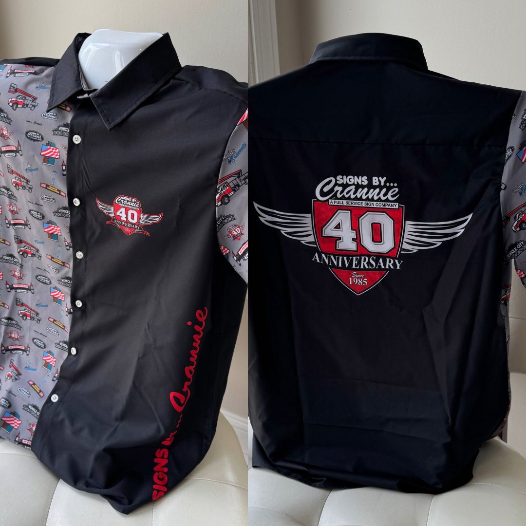 Two black button-up shirts with a red-and-white 40th anniversary winged logo, front and back views.