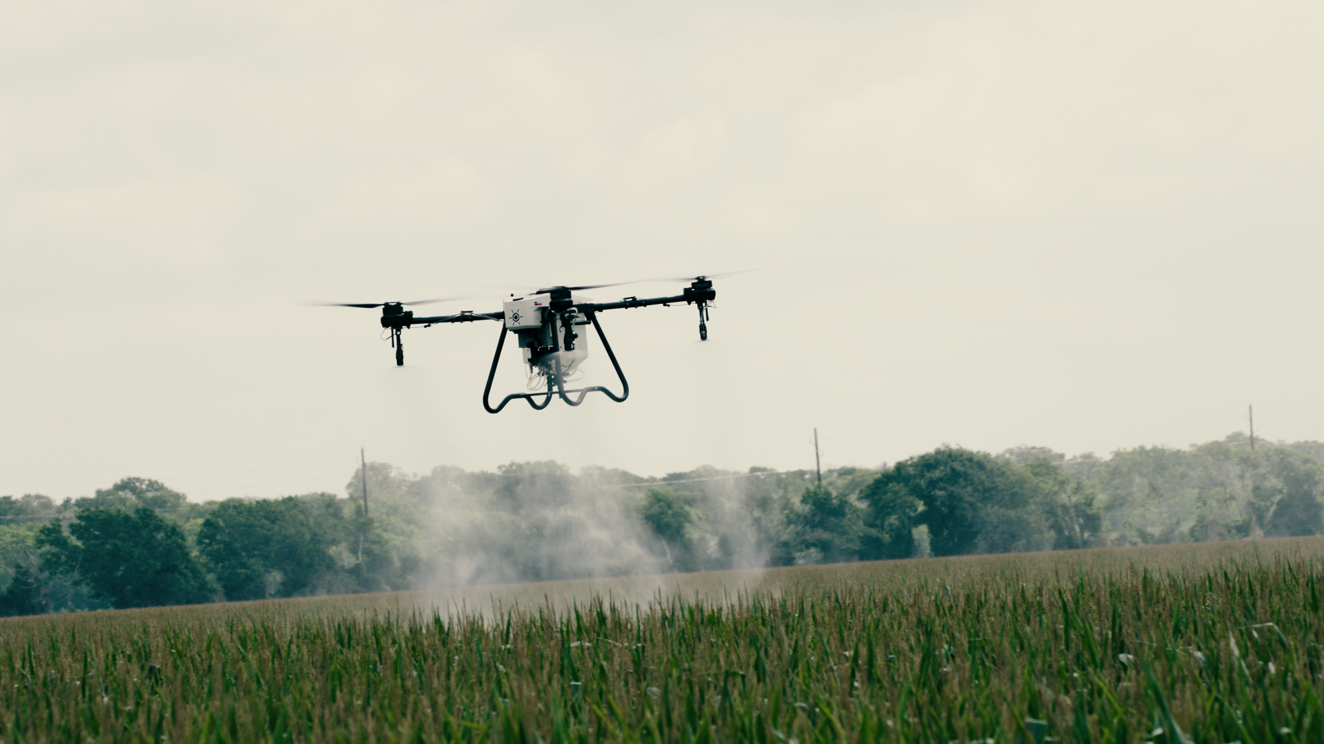Hylio Ares Drone Spraying Crop