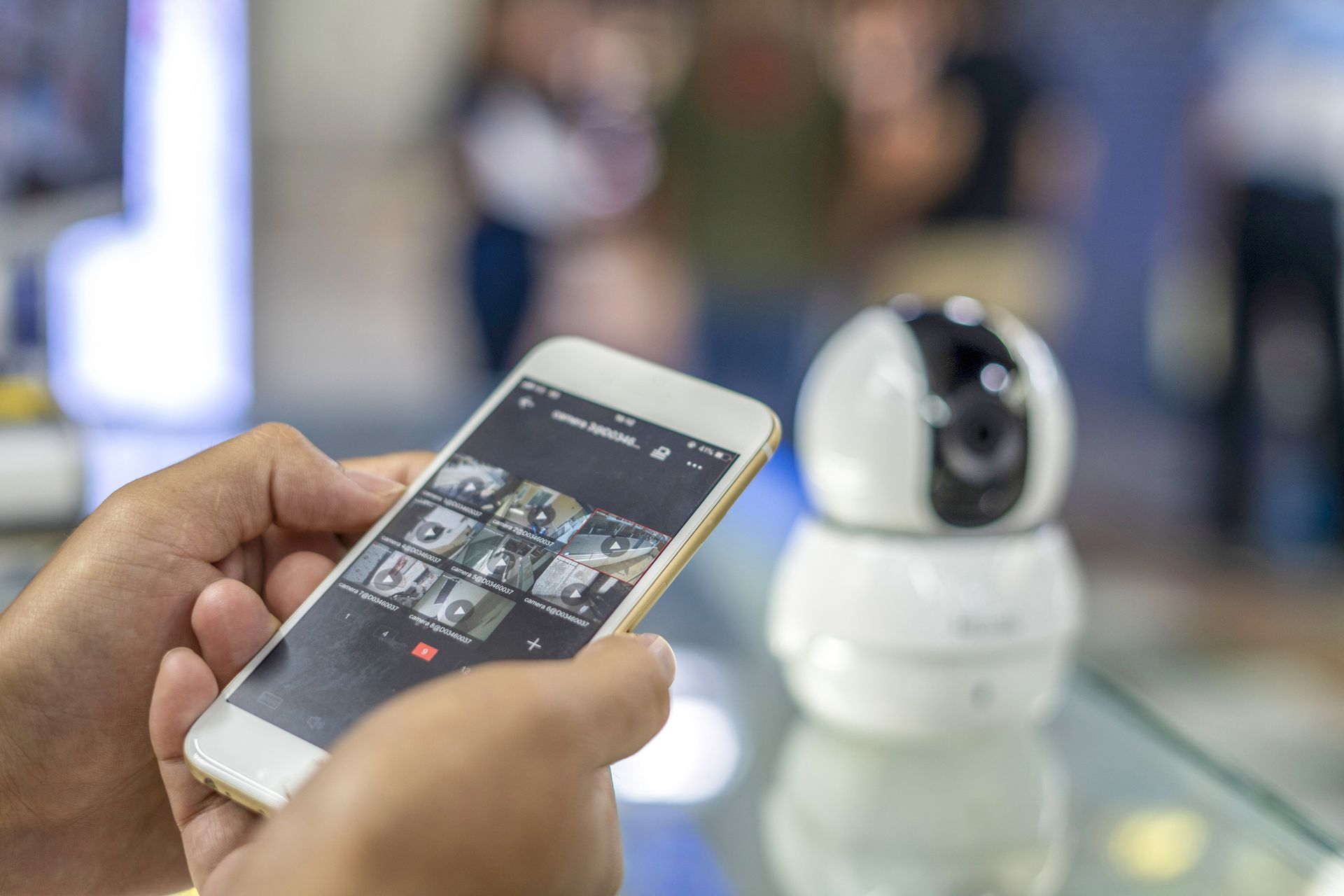 A person is watching the surveillance system from their phone.