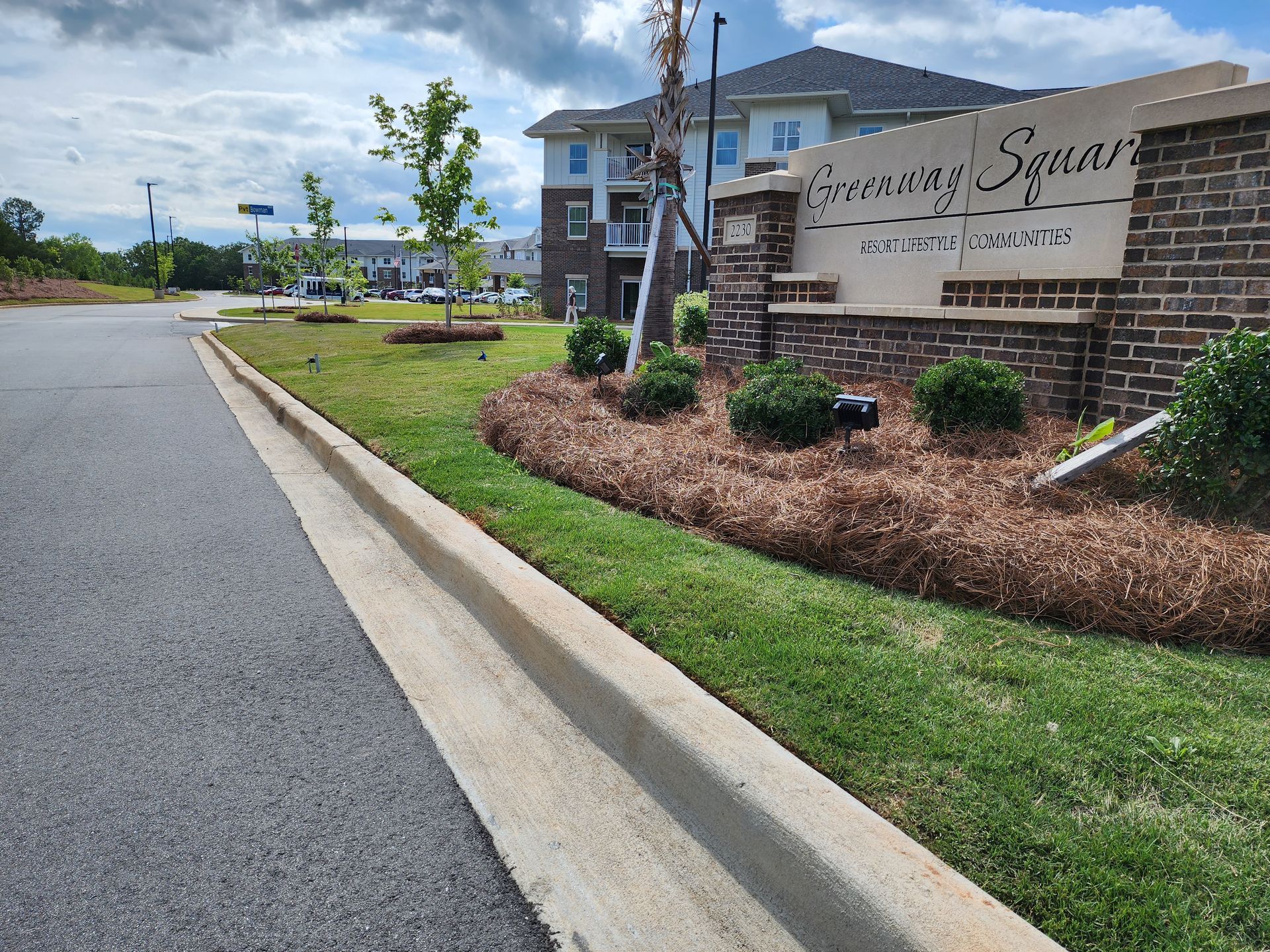 A building with a sign on the front — Kershaw, SC — Absolute Landscapes