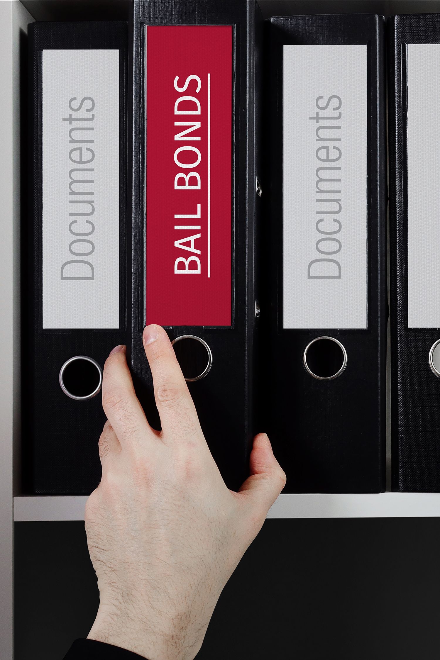 Bail Bonds. Folder with label on the shelf of a lawyer. Bail Bonds. Folder with label on the shelf of a lawyer.