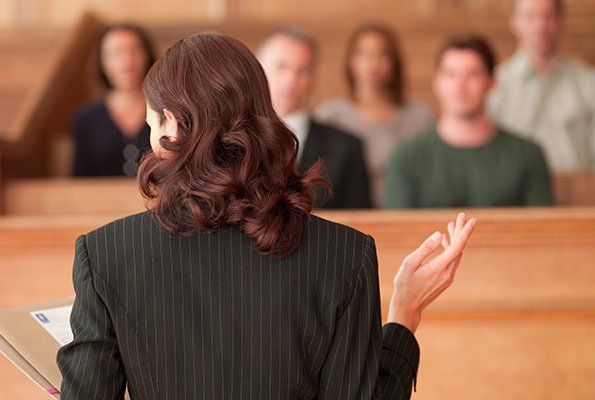 Attorney Infront Of Jury — St. Minneapolis, MN — Absolute Bail Bonds Attorney Infront Of Jury — St. Minneapolis, MN — Absolute Bail Bonds