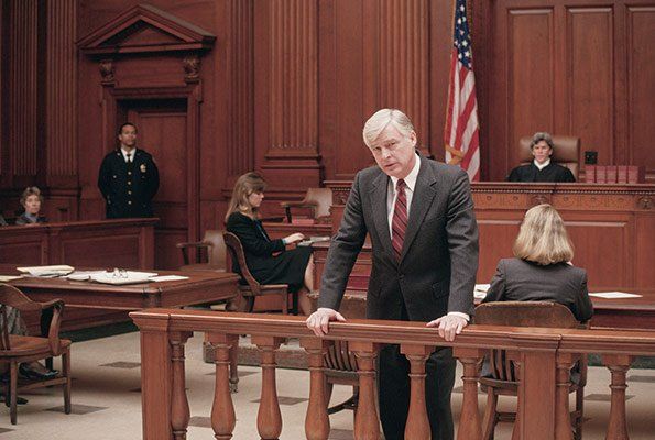 Attorney Talking Infront Of Courtroom — St. Minneapolis, MN — Absolute Bail Bonds Attorney Talking Infront Of Courtroom — St. Minneapolis, MN — Absolute Bail Bonds
