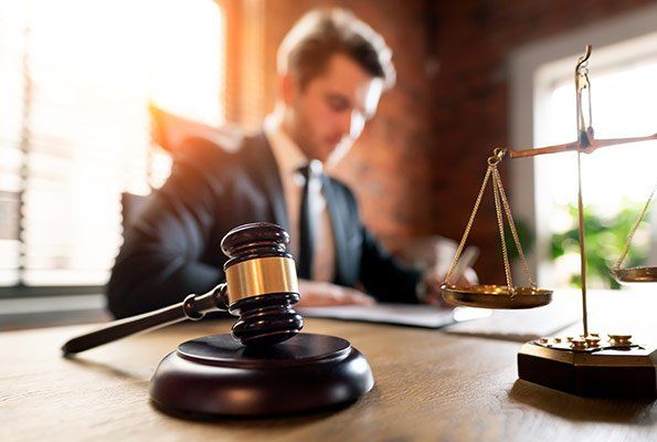 Attorney On His Desk — St. Minneapolis, MN — Absolute Bail Bonds Attorney On His Desk — St. Minneapolis, MN — Absolute Bail Bonds
