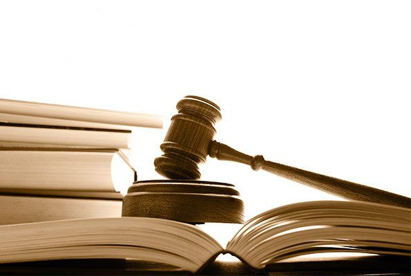 Gavel On Top Of Law Book — St. Minneapolis, MN — Absolute Bail Bonds Gavel On Top Of Law Book — St. Minneapolis, MN — Absolute Bail Bonds