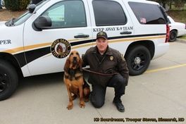 DOG WITH POLICEMAN