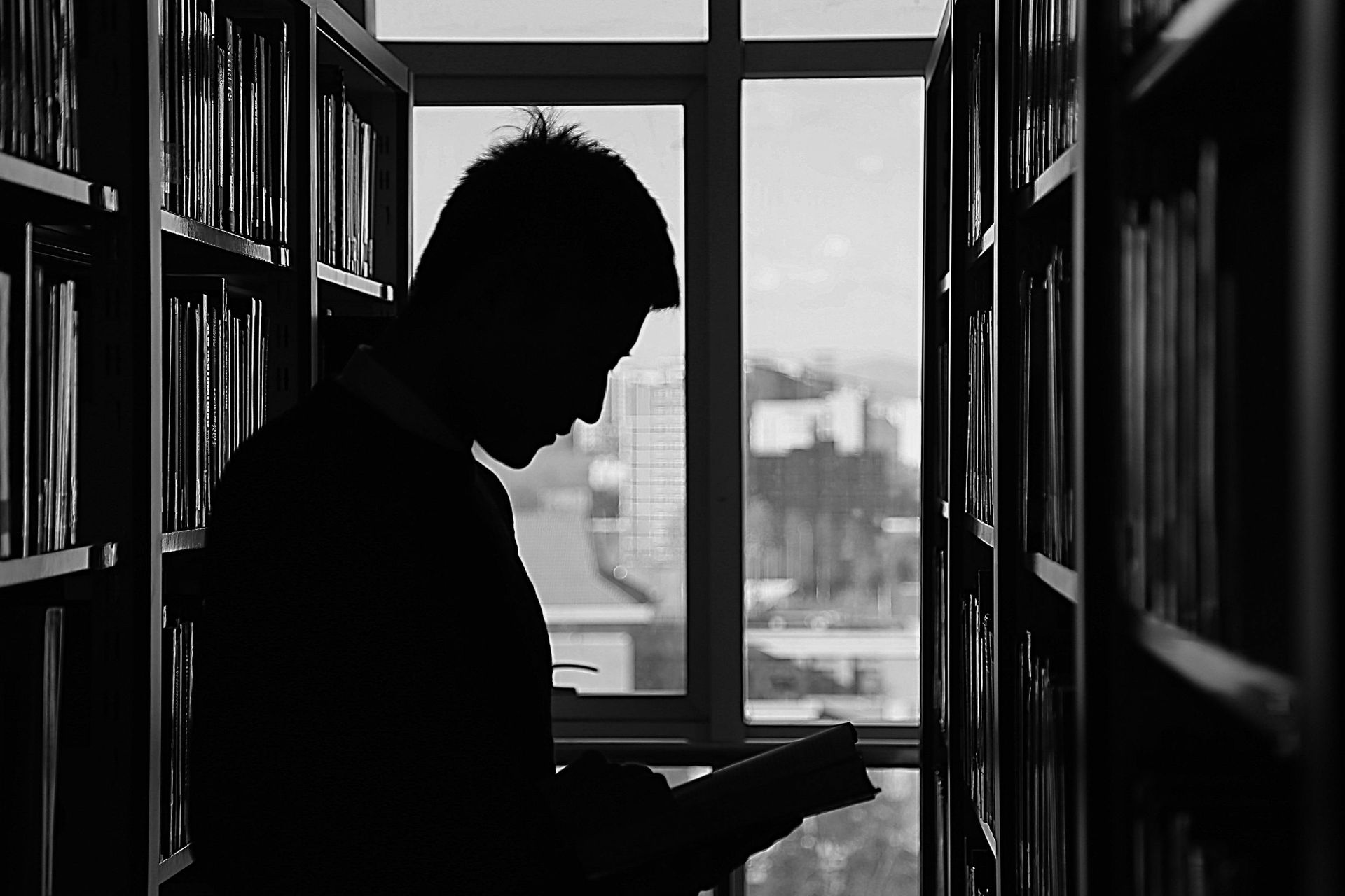 Private investigator conducting research in the shadows UK