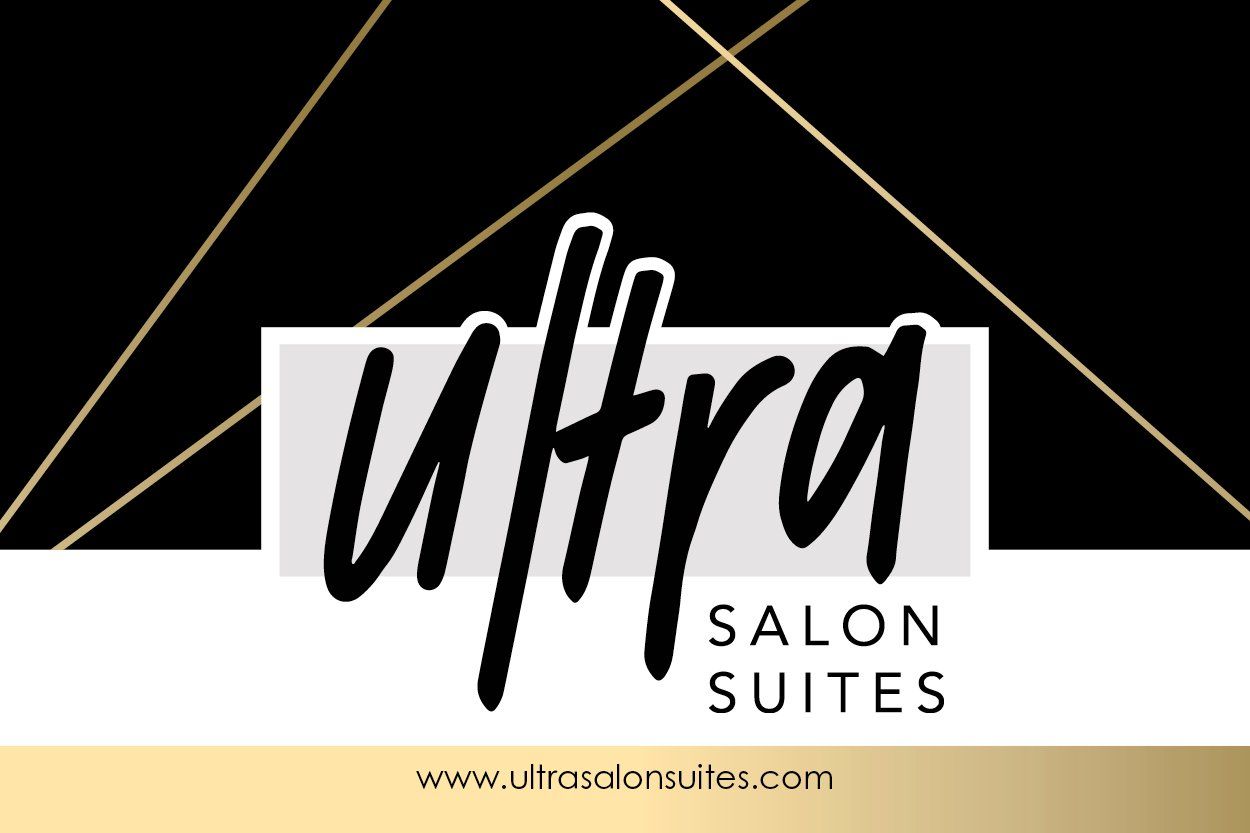 A black and white logo for ultra salon suites