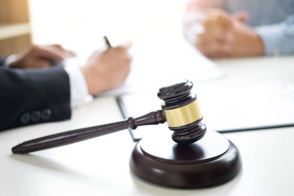 In Court: Man Standing Before a Judge — Traffic Lawyer in Wagga Wagga