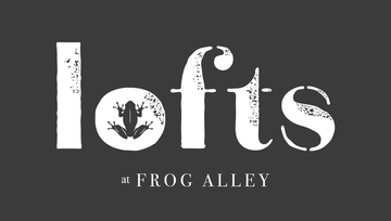 A logo for lofts at frog alley with a frog on it