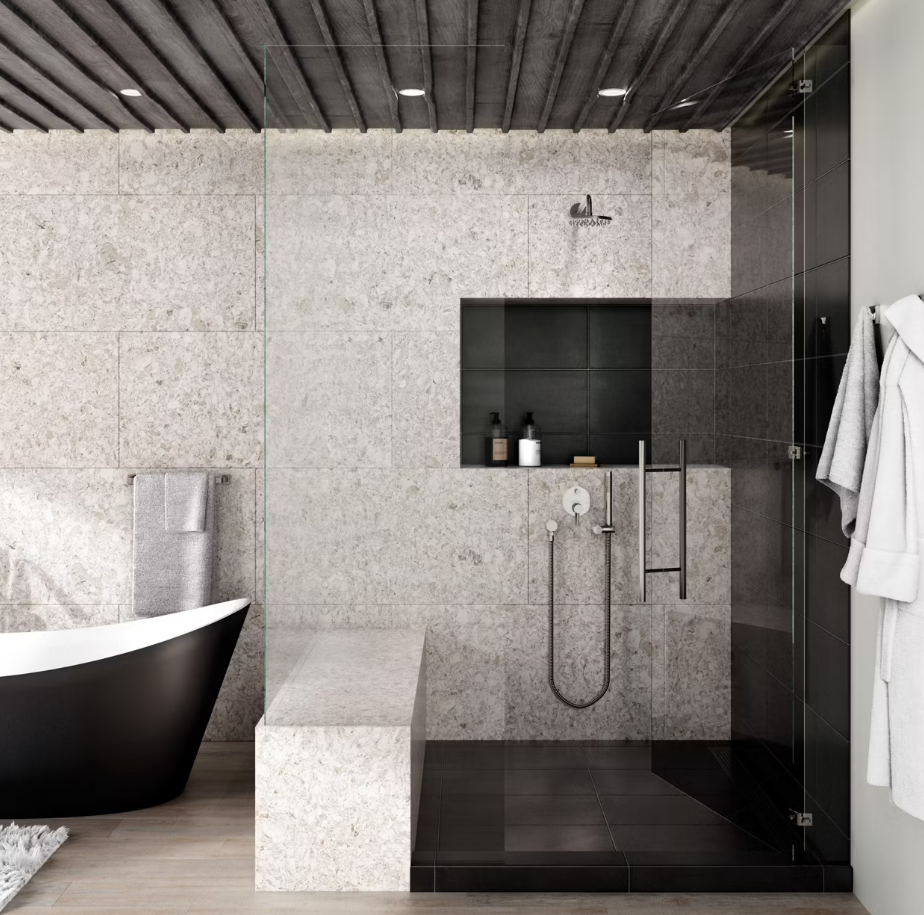 Modern bathroom with a black tub, walk-in shower, stone walls, and a recessed shelf.