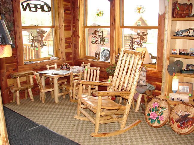 A room with a rocking chair and a sign that says vero