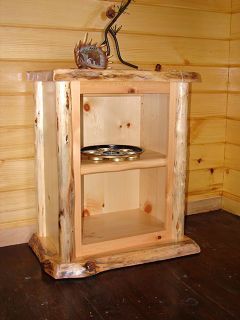 A wooden shelf with a statue of a bear on top of it.