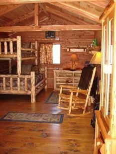 There is a rocking chair in the middle of the room.
