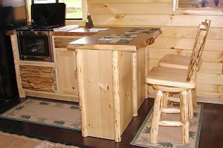 A wooden table and chairs in a wooden cabin.