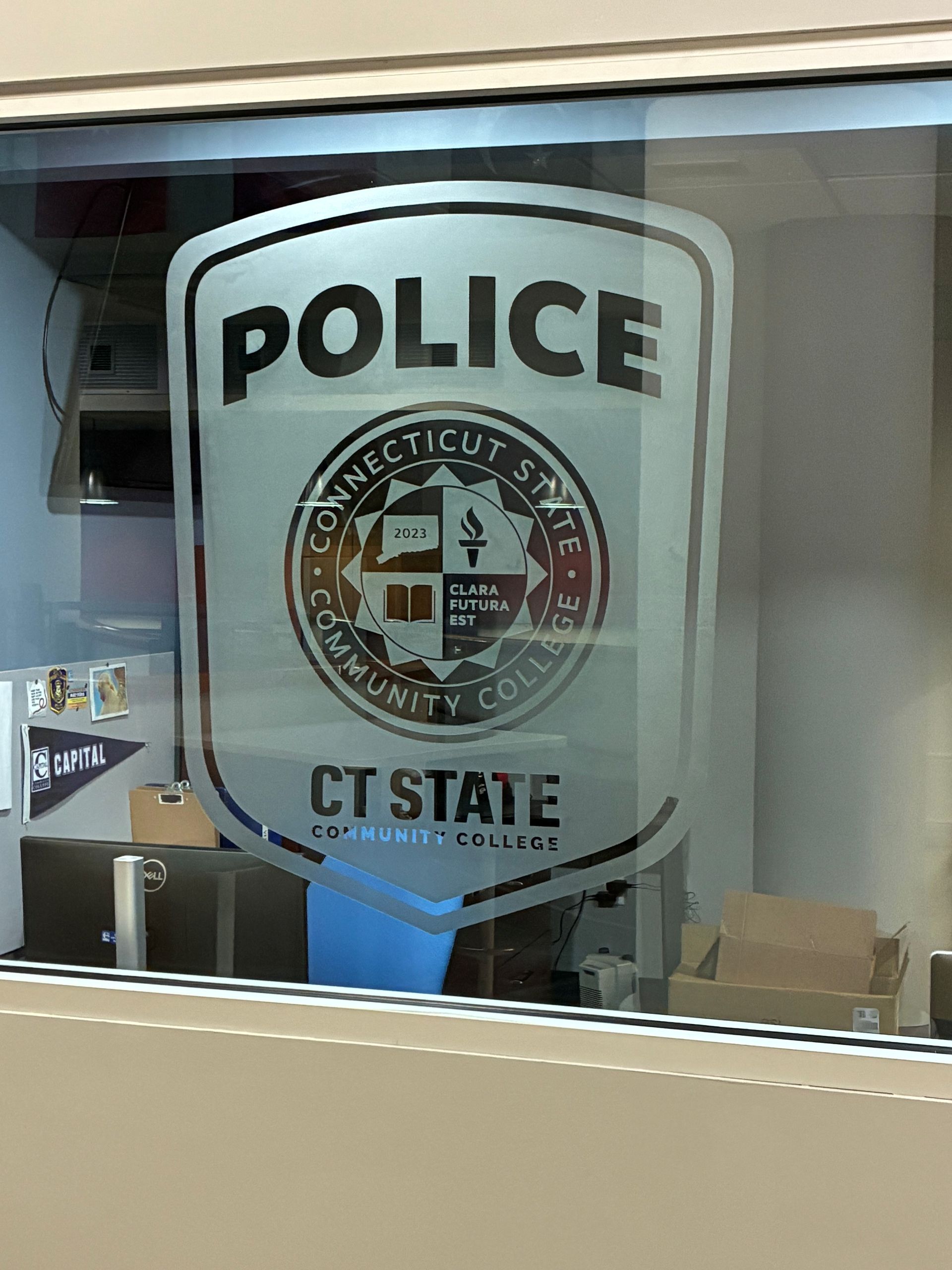 Police department window decal with shield emblem and “CT STATE” text