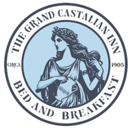 A logo for the grand castalian inn bed and breakfast