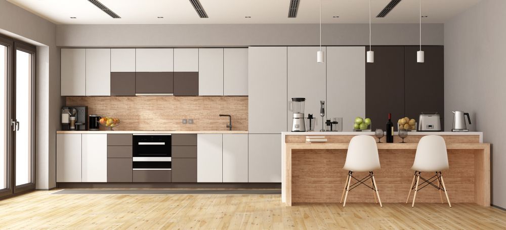 Modern Kitchen With White and Brown Cabinets — Brayden Stewart Building In Forster, NSW