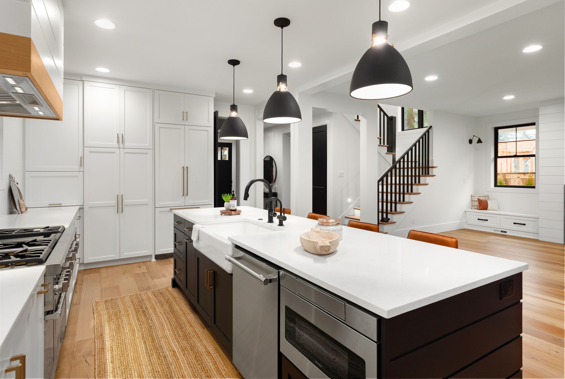 Modern Kitchen With White Countertops, Dark Island — Brayden Stewart Building In Forster, NSW