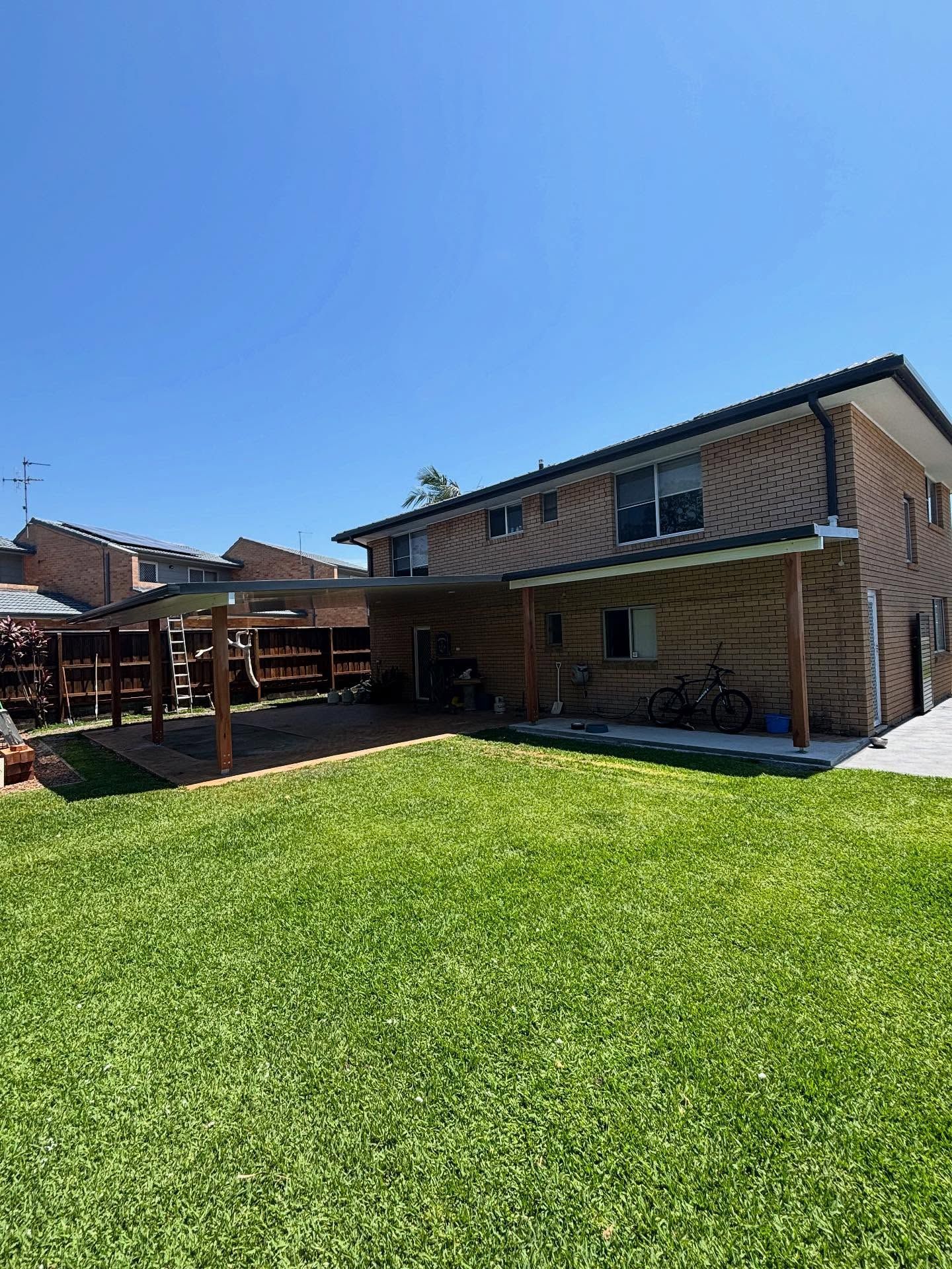 Backyard of a Two-story Brick House — Brayden Stewart Building In Forster, NSW