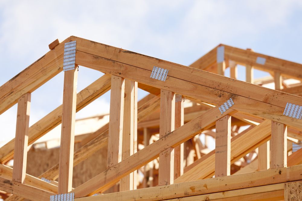 Wooden Roof Trusses Being Constructed Outdoors — Brayden Stewart Building In Forster, NSW