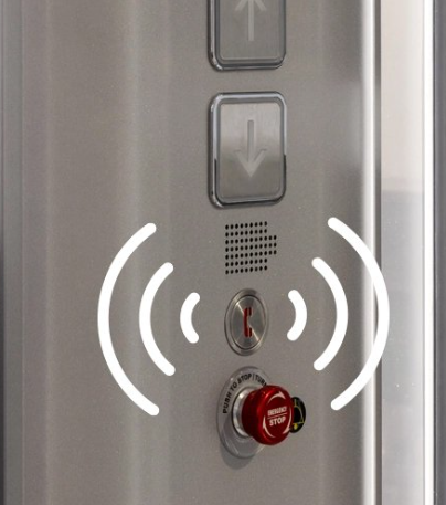 Elevator panel with up and down buttons, speaker grille, and red emergency stop button with wireless signal icon