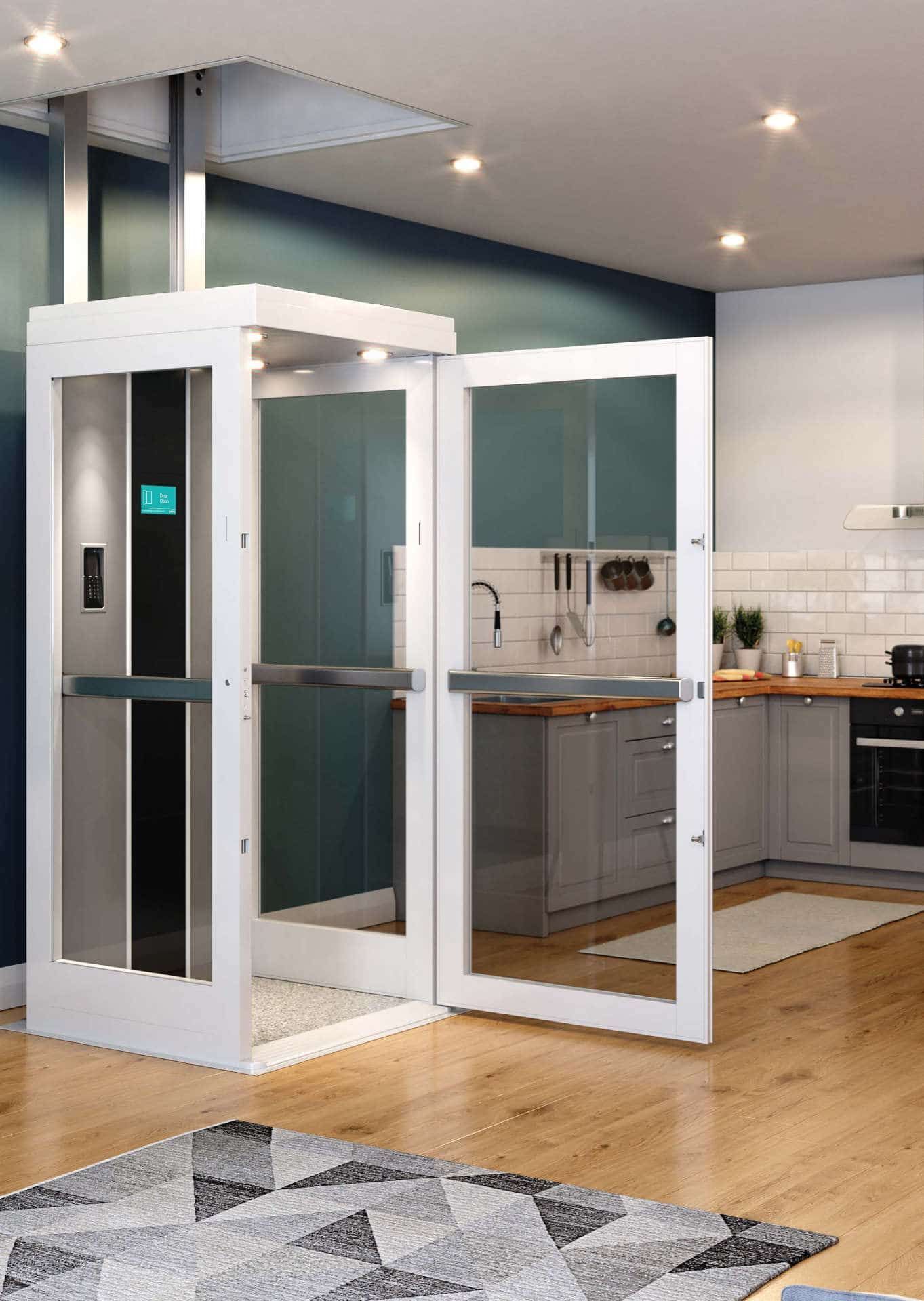 A residential through-floor elevator with a white frame and glass door, installed in a modern home kitchen setting.