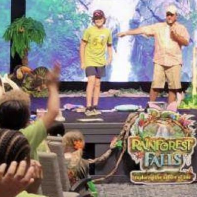 Worship moment &mdash; congregants with hands raised
