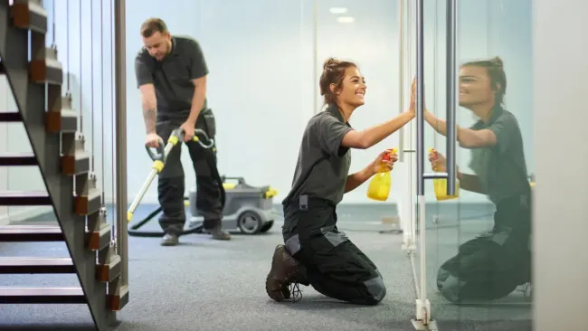 Cleaning the Floor and Wiping the Glass Door — Waterbury, CT — Dependable Cleaning Service CT