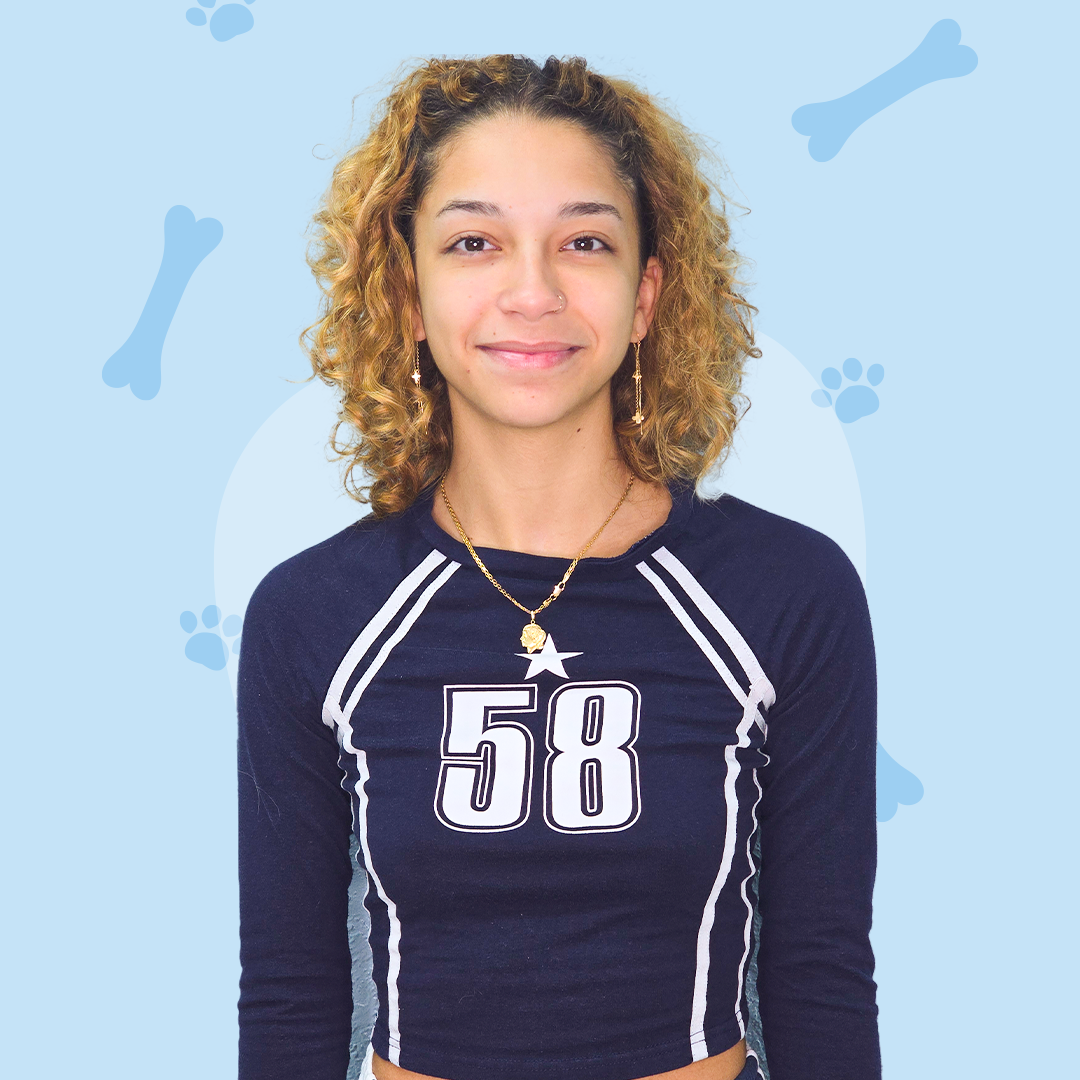 A woman wearing a shirt with the number 58 on it