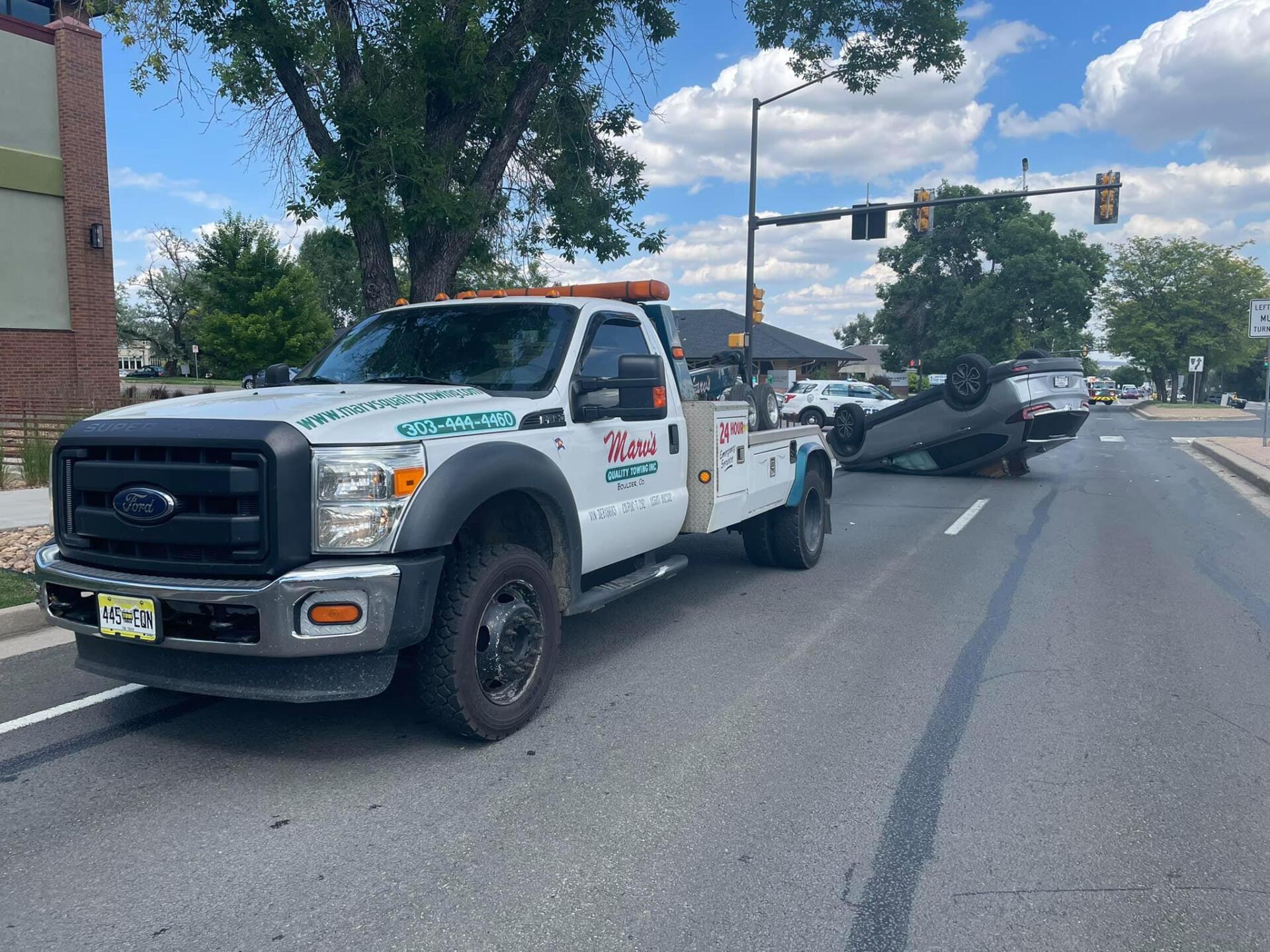 Tow Truck in Accident — Boulder, CO — Marv’s Quality Towing Inc