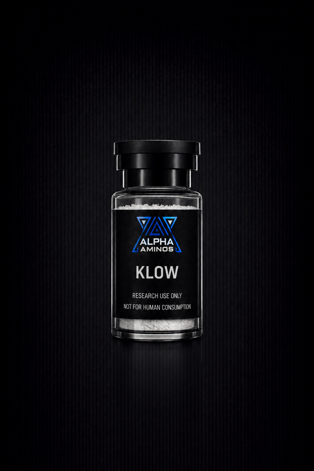 Black bottle of Alpha Klow fragrance on a dark background