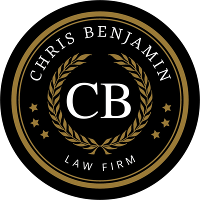 Chris Benjamin Law Firm logo with gold laurel wreath and CB monogram on black background