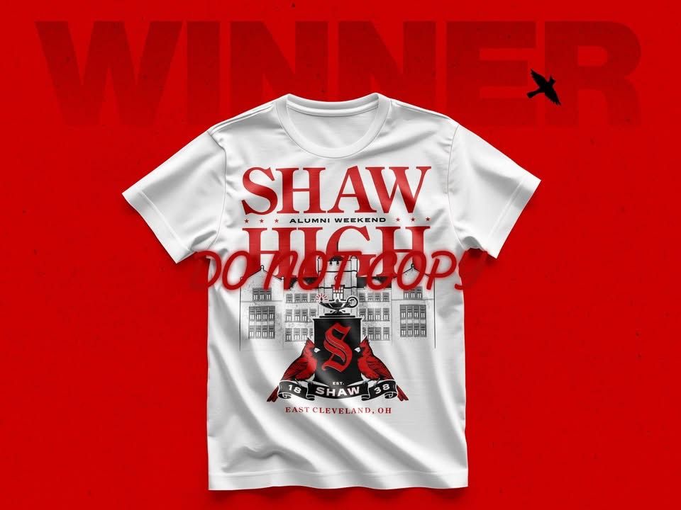 White graphic T-shirt on red background with large “WINNER” text and bold “SHAW” lettering